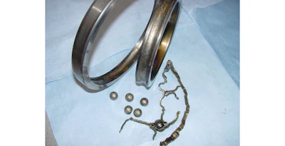 Oil analysis reveals a severely damaged bearing in a bottle washing machine.