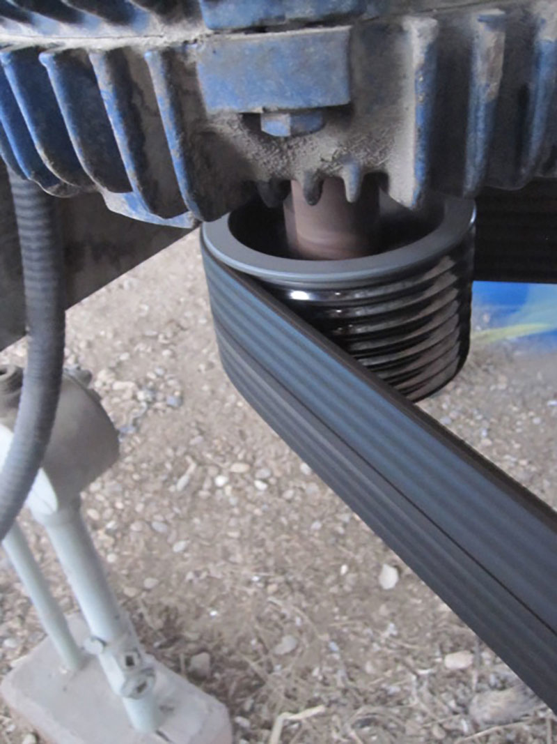 The lack of belt wrap and the shin on the pulley from belt slip shows why V-belts are not very effective for driving air coolers.