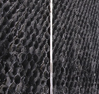 Heat transfer fill with excessive scale buildup should be cleaned or replaced.