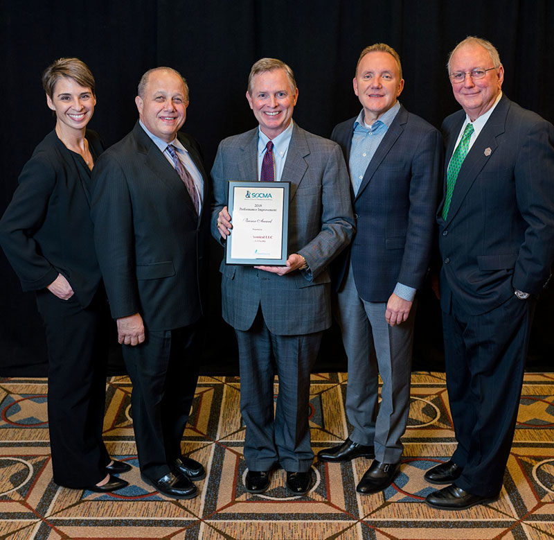 MFG Chemical receives Safety Improvement Award from Society of Chemical Manufacturers & Affiliates (SOCMA). L to R: President & CEO SOCMA Jennifer Abril; MFG Chemical Marketing Communications Jon Amdursky; MFG Chemical President & CEO Keith Arnold (holding Safety Improvement Award); MFG Chemical Board Director Paul Turgeon; SOCMA Board of Governors Chairman Gene Williams.