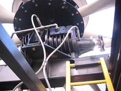 Two accelerometer transducers are mounted on a gear drive near the low speed output/fan shaft (left) and the high-speed input shaft. This arrangement could be utilized as part of a vibration management program.