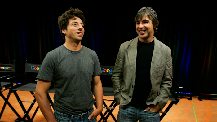 In this Sept. 2, 2008, file photo Google co-founders Sergey Brin, left, and Larry Page talk about the new Google Browser, 'Chrome,' during a news conference at Google Inc. headquarters in Mountain View, Calif. Page and Brin are stepping down from their roles within the parent company, Alphabet. Page, who had been serving as CEO of Alphabet, and Brin, who had been president of Alphabet, will remain on the board of the company.