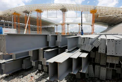 In this Dec. 8, 2013 file photo, steel beams sit outside Arena de Sao Paulo in Sao Paulo, Brazil.