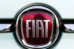 In this Oct. 31, 2019 file photo, a Fiat logo is pictured on a car in Bayonne, southwestern France. Unionized workers at Fiat Chrysler have voted overwhelmingly to approve a new four-year contract with the company. The ratification means the United Auto Workers union has settled with all three Detroit automakers. General Motors workers ratified an agreement in October after a 40-day strike, while Ford Workers settled in November. About 71% of Fiat Chrysler workers voted in favor of the deal, the UAW said Wednesday, Dec. 11, 2019. The union has about 47,000 members at Fiat Chrysler.