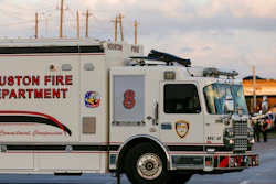In this Sunday, Dec. 15, 2019 photo, officials respond to the scene of a mercury spill on the intersection of Westview Drive and West Sam Houston Parkway North. A person has been taken into custody for questioning after dozens of people were decontaminated as a precaution due to trace amounts of mercury spilled at three locations in Houston, the FBI said Monday.