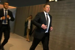 In this frame grab from video, Tesla CEO Elon Musk leaves court, Tuesday, Dec. 3, 2019, in Los Angeles. Musk denied that he meant to call a British cave diver a pedophile when he dubbed him 'pedo guy' on social media.