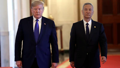 President Donald Trump walks with Chinese Vice Premier Liu He to the East Room of the White House on Wednesday, Jan. 15 in Washington to sign a trade agreement.