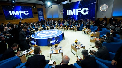 In this Oct. 19, 2019, file photo, members of the International Monetary and Financial Committee (IMFC) meet at the World Bank/IMF Annual Meetings in Washington.