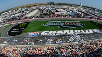 In this Sept. 28, 2019, file photo Chase Briscoe (98) leads the field of cars to start the NASCAR Xfinity Series auto race at Charlotte Motor Speedway in Concord, N.C. General Motors is planning to open a new technical center for performance and auto racing near the Charlotte Motor Speedway. The center will focus on transferring auto racing knowledge into engineering for vehicles that are sold to the public.