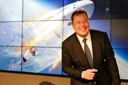 In this Jan. 19, 2020, file photo Elon Musk, founder, CEO, and chief engineer/designer of SpaceX speaks during a news conference at the Kennedy Space Center in Cape Canaveral, Fla. The meteoric rise of Tesla shares that pushed the company's value over $100 billion could turn into a supercharged payday for CEO Elon Musk.