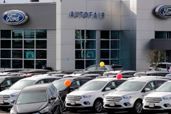 In this Thursday, Aug. 15, 2019 file photo,Cars for sale at the Ford dealership in Manchester, N.H. New vehicle sales in the U.S. fell slightly last year, but the numbers still passed the healthy 17 million mark for the fifth straight year. Automakers sold 17.1 million new cars, trucks and SUVs in 2019, down about 1% from the previous year.