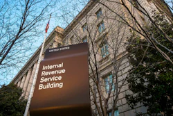 This April 13, 2014, file photo, shows the Internal Revenue Service headquarters building in Washington. A federal judge says it's likely that Microsoft was trying to avoid or evade paying U.S. taxes and is ordering the company to hand over financial documents from more than a decade ago.