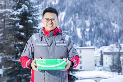 A JD.com staff member wears a uniform made of recycled PET (rPET) materials co-created by Coca-Cola China and JD.com which demonstrates used PET bottles can be back to the value chain and be recycled into rPET products.