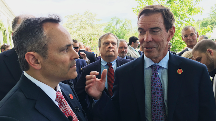In this April 26, 2107 photo, Braidy Industries Inc. CEO Craig Bouchard, right, and Republican Gov. Matt Bevin speak with reporters in Wurtland, Ky.