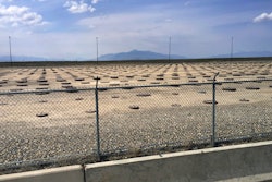 In this May 11, 2015 file photo, nuclear waste is stored in underground containers at the Idaho National Laboratory near Idaho Falls, Idaho. A nuclear test reactor in Idaho that develops fuel for the nation's fleet of nuclear-powered warships among other tasks will remain operating.