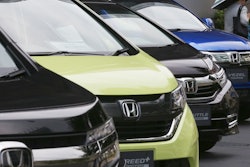 In this July 31, 2019, file photo, Honda cars are displayed at the automaker's headquarters in Tokyo.