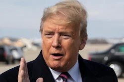 President Donald Trump speaks with reporters as he boards Air Force One as he departs Tuesday, Feb. 18, 2020, at Andrews Air Force Base, Md.