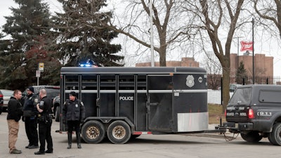 Police work outside the Molson Coors Brewing Co. campus in Milwaukee on Wednesday, Feb. 26 after reports of a possible shooting.