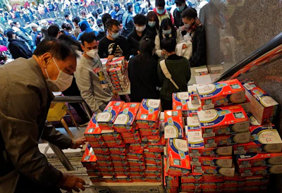 In this Feb. 5, 2020 file photo, citizens line up to buy face masks in Hong Kong. Fear of the spreading coronavirus has led to a global run on sales of face masks despite medical experts' advice that most people who aren't sick don't need to wear them.