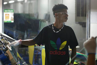 This image released by Netflix shows Zach Ray at work at the Fuyao Glass America factory in Dayton, Ohio, in a scene from the Oscar-nominated documentary 'American Factory.'
