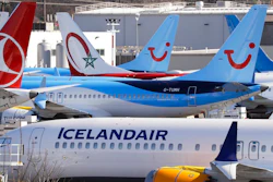 Grounded Boeing 737 MAX airplanes fill a parking area adjacent to Boeing Field, Wednesday, Feb. 19, 2020, in Seattle. Washington state lawmakers say they will introduce bills, at The Boeing Co.'s request, to suspend the aerospace giant's preferential business and occupation tax rate until the United States and European Union resolve their long-running international trade dispute.