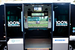 This Nov. 17, 2017, file photo shows a view inside an electric driverless shuttle produced by EasyMile, during an experiment, in Paris. The U.S. government's highway safety agency has ordered an autonomous shuttle company to stop carrying passengers in 16 U.S. cities after a mysterious braking problem occurred in Columbus, Ohio. The National Highway Traffic Safety Administration says the suspension will remain in place while it examines safety issues with the low-speed shuttles operated by France-based EasyMile.