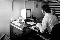 In this 1970s photo provided by Xerox PARC, Larry Tesler uses the Xerox Parc Alto early personal computer system.