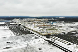 In this Nov. 28, 2018, file photo, snow covers the perimeter of the General Motors' Lordstown plant, in Lordstown, Ohio. The Trump administration’s budget proposal scraps a loan program that could help an upstart electric vehicle company’s plans to reuse the now-closed General Motors factory in Lordstown, Ohio.