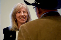 Former Interior Secretary Gale Norton mingles after a news conference in Denver on Monday, Feb. 10, 2020, a day before the Trump administration hosts the first of two hearings on a proposal to roll back a landmark environmental law.