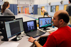 Research engineer Matthew Solomito analyzes data as Central Connecticut pitcher Michael DeLease throws off a smart mound at the Center for Motion Analysis in Farmington, Conn. on Tuesday, Jan. 28, 2020. The new technology allows scientists to better study pitching mechanics to enhance efficiency and prevent injuries.