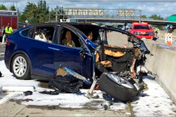 In this March 23, 2018, file photo provided by KTVU, emergency personnel work a the scene where a Tesla electric SUV crashed into a barrier on U.S. Highway 101 in Mountain View, Calif. The Apple engineer who died when his Tesla Model X crashed into the concrete barrier complained before his death that the SUV’s Autopilot system would malfunction in the area where the crash happened. The complaints were detailed in a trove of documents released Tuesday, Feb. 11, 2020, by the U.S. National Transportation Safety Board, which is investigating the March, 2018 crash that killed engineer Walter Huang.