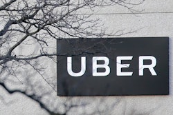 In this Nov. 15, 2019, file photo is an Uber office in Secaucus, N.J. Uber continued to lose cash as it poured money into building its food delivery business and developing technology for driverless cars, but revenue for its rides business nearly tripled as the company picked up more passengers around the world. The ride-hailing giant lost $1.1 billion in the fourth quarter of 2019, about 24% more than it lost at the same time last year.