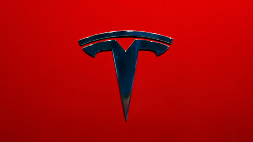 This Oct. 3, 2018, file photo shows the logo of Tesla Model 3 at the Auto show in Paris.