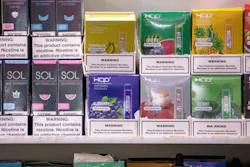 This Jan. 31, 2020 photo shows various brands and flavors of disposable vape devices at a store in the Brooklyn borough of New York. On Thursday, Feb. 6, 2020, the U.S. government began enforcing restrictions on flavored electronic cigarettes aimed at curbing underage vaping.