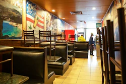 The dining section is closed off at East Side Pockets, a small restaurant near Brown University, Wednesday, March 25, 2020, in Providence, R.I. President Donald Trump wants the country open for business by mid-April, but some experts warn it's not as easy as flipping a switch.