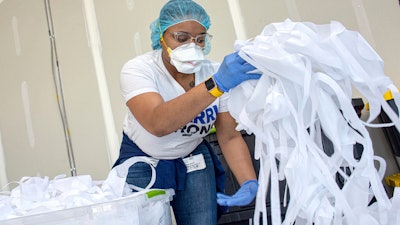 This undated image provided by LifeBridge Health shows masks being made in Baltimore.