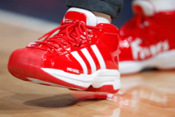 New Orleans Pelicans forward Derrick Favors wears Christmas-themed Adidas Pro Model Superstars shoes in the first half of an NBA basketball game Wednesday, Dec. 25, 2019, in Denver, USA.