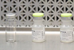 This March 16, 2020 file photo shows vials used by pharmacists to prepare syringes used on the first day of a first-stage safety study clinical trial of the potential vaccine for COVID-19.