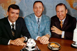 In this April 10, 1970 photo made available by NASA, Apollo 13 astronauts, from left, Fred Haise, Jack Swigert and Jim Lovell gather for a photo on the day before launch.