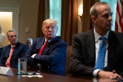 House Minority Leader Kevin McCarthy of Calif., President Donald Trump, and Chevron CEO Mike Wirth listen during a meeting.