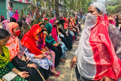 Bangladeshi garment workers block a road demanding their unpaid wages during a protest in Dhaka, Bangladesh, Thursday, April 16, 2020.