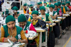 In this April 19, 2018 file photo, trainees work at Snowtex garment factory in Dhamrai, near Dhaka, Bangladesh.