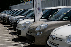 Cars are parked at a Fiat Chrysler car dealer in Milan, Italy.