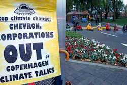 Demonstrators block the main entrance of Chevron Corp. in San Ramon, Calif.