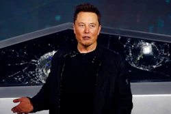 In this Nov. 21, 2019, file photo, Tesla CEO Elon Musk introduces the Cybertruck at Tesla's design studio in Hawthorne, Calif. Tesla CEO Elon Musk appears to have hit all the milestones necessary to receive a stock award currently worth about $730 million to pad the eccentric billionaire's already vast fortune. The electric car maker ended Wednesday, May 6, 2020, with an average market value of $100.4 billion for the past six months, according to data drawn from FactSet Research.