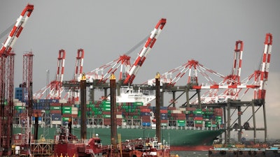 A container ship is docked at Maher Terminals in Elizabeth, N.J., Monday, May 11, 2020.