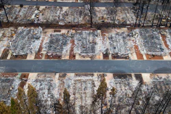 This Dec. 3, 2018, file photo, shows homes leveled by the Camp Fire line the Ridgewood Mobile Home Park retirement community in Paradise, Calif. Pacific Gas & Electric limped into bankruptcy vilified for its long-running neglect of a crumbling electrical grid that ignited horrific Northern California wildfires that left entire cities in ruins. After nearly a year-and-a-half of wrangling during one of the most complex bankruptcy cases in U.S. history, it’s unclear if PG&E is now any better equipped to protect the 16 million people who rely on it for power.