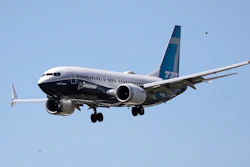 A Boeing 737 MAX jet heads to a landing at Boeing Field following a test flight.