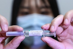 A sample of a potential COVID-19 vaccine at a SinoPharm plant in Beijing, April 10, 2020.