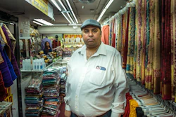 Chander Shekhar, co-owner of Shopno Fashion in New York's Jackson Heights neighborhood.